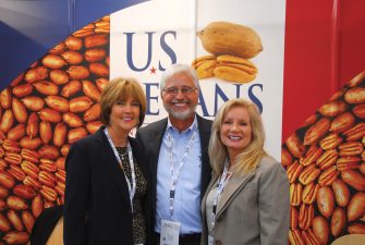 From left, Helen Watts with Young Pecan Co., Marty Harrell with Harrell Pecan Co. and Jeanne Harrell were on hand to help man the U.S. Pecans booth at the SIAL Paris trade show Oct. 21-25. (Photo by Blair Krebs)