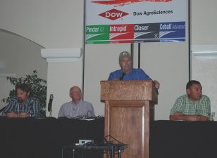 A grower panel at WPGA discussed pressurized irrigation systems. Pictured from left are Barrett Blain, Bill Spear, Harold Payne and Brian Driscoll. (Photo by Cindy Wise)