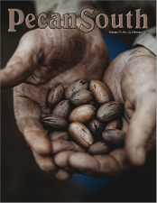 The cover of Pecan South's February 2023 issue features the Pecan South logo at the top and the volume and issue number below that logo. The image is a man's dirty hands after harvest holding a handful of inshell pecans.
