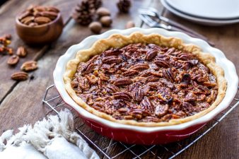 Pecan Pie in a red baking dish.