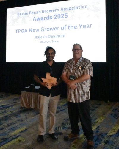 Texas Pecan Growers Association and Texas Pecan Board Awards. TPGA New Grower of the Year- Rajesh Devineni - Presented by Troy Swift, TPGA President